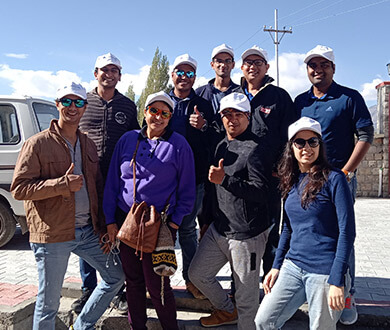 Edelweiss volunteers beaming after helping build a playground in a Ladakhi school Life-At-Edelweiss